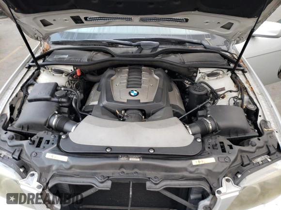 2006 BMW 7 Series 750i with VIN WBAHL83586DT05258, listed as a Copart auction lot 77033744 with 129,376 mi miles and Salvage Title. Bid and sale history available at DreamBid. Image 11.
