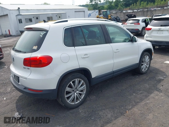 2012 Volkswagen Tiguan SE with VIN WVGAV7AX9CW607960, listed as a IAAI auction lot 42679977 with 106,335 mi miles and . Bid and sale history available at DreamBid. Image 4.