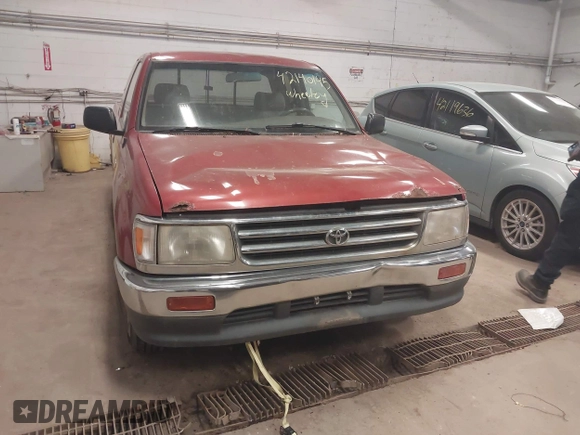 1995 Toyota T100 DX with VIN JT4VD12E0S0013715, listed as a IAAI auction lot 42140145 with 276,371 mi miles. Bid and sale history available at carsss.com. Image 6.