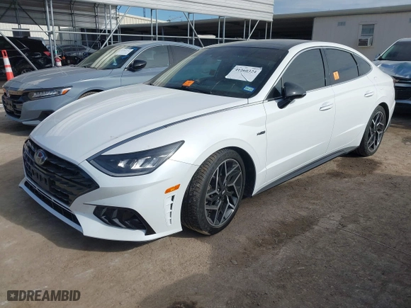 2021 Hyundai Sonata N Line with VIN 5NPEK4JC5MH128470, listed as a IAAI auction lot 41260324 with 58,488 mi miles. Bid and sale history available at carsss.com. Image 2.