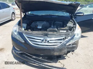 2014 Hyundai Sonata Limited with VIN 5NPEC4AB3EH841311, listed as a IAAI auction lot 42010642 with 148,558 mi miles and . Bid and sale history available at DreamBid. Image 6.