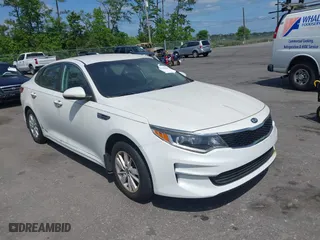 2016 Kia Optima LX with VIN KNAGT4L3XG5095972, listed as a IAAI auction lot 42130422 with 103,420 mi miles. Bid and sale history available at carsss.com. Image 1.
