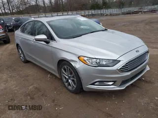 2017 Ford Fusion SE z VIN 3FA6P0H78HR174956, wystawiony jako IAAI lot #41258610 z przebiegiem 70 180 mil mil oraz . Historia ofert i sprzedaży dostępna na DreamBid. Obrazek 1.