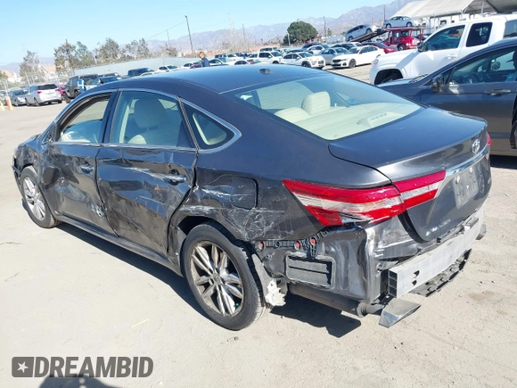 2015 Toyota Avalon Limited with VIN 4T1BK1EB3FU149678, listed as a IAAI auction lot 41372504 with 108,776 mi miles and . Bid and sale history available at DreamBid. Image 3.