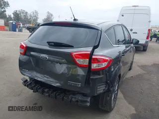 2018 Ford C-Max Titanium with VIN 1FADP5DU4JL105072, listed as a IAAI auction lot 42110522 with 93,176 mi miles and . Bid and sale history available at DreamBid. Image 4.