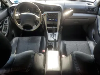 2003 Subaru Baja z VIN 4S4BT61C937108961, wystawiony jako Copart lot #57433465 z przebiegiem 242 989 mil mil oraz Tytuł czysty. Historia ofert i sprzedaży dostępna na DreamBid. Obrazek 8.