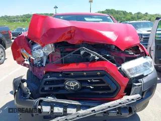 2021 Toyota Tacoma SR with VIN 3TYRX5GN6MT016261, listed as a IAAI auction lot 42203262 with 78,744 mi miles and . Bid and sale history available at DreamBid. Image 6.