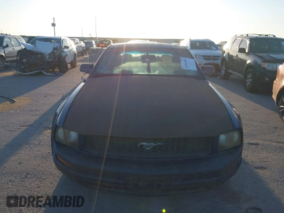 2005 Ford Mustang Deluxe z VIN 1ZVFT80N155124281, wystawiony jako IAAI lot #41941404 z przebiegiem Nie podano mil oraz . Historia ofert i sprzedaży dostępna na DreamBid. Obrazek 6.