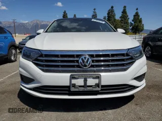 2021 Volkswagen Jetta SEL with VIN 3VWE57BU9MM082391, listed as a Copart auction lot 51993815 with 22,589 mi miles and Salvage title. Bid and sale history available at DreamBid. Image 5.