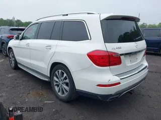 2014 Mercedes-Benz GL 450 with VIN 4JGDF7CE5EA408944, listed as a IAAI auction lot 42397384 with 182,106 mi miles and . Bid and sale history available at DreamBid. Image 3.