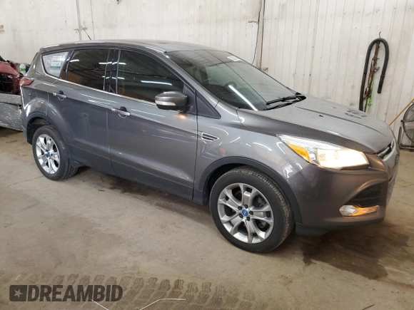 2013 Ford Escape SEL with VIN 1FMCU9H9XDUB66299, listed as a Copart auction lot 52802395 with 135,906 mi miles and Salvage Title. Bid and sale history available at carsss.com. Image 4.