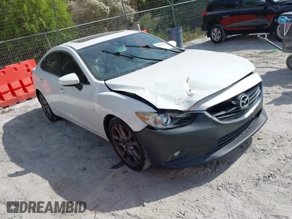 2015 Mazda 6 i Grand Touring with VIN JM1GJ1W50F1204322, listed as a IAAI auction lot 40694216 with 141,357 mi miles. Bid and sale history available at carsss.com. Image 1.