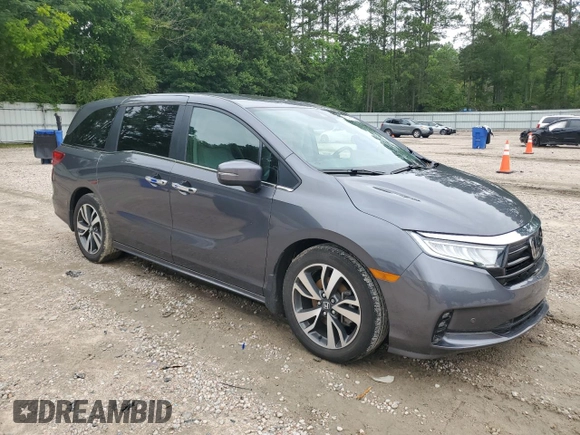 2023 Honda Odyssey Touring with VIN 5FNRL6H86PB024066, listed as a Copart auction lot 58414575 with 29,827 mi miles and Salvage title. Bid and sale history available at DreamBid. Image 4.