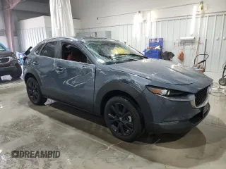 2024 Mazda CX-30 S Carbon Edition with VIN 3MVDMBCM7RM637315, listed as a Copart auction lot 55108695 with 8,476 mi miles and Salvage title. Bid and sale history available at DreamBid. Image 4.