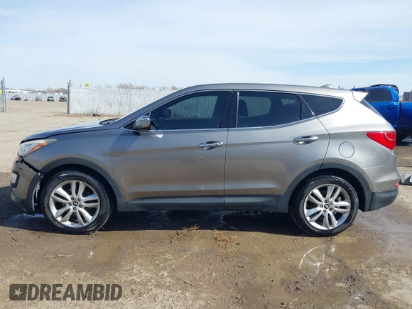 2013 Hyundai Santa Fe Sport z VIN 5XYZWDLA1DG003779, wystawiony jako IAAI lot #41761431 z przebiegiem 127 895 mil mil oraz . Historia ofert i sprzedaży dostępna na DreamBid. Obrazek 14.