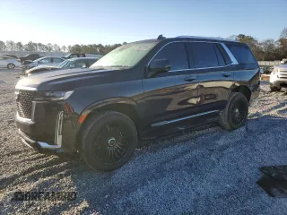 2023 Cadillac Escalade 4WD Premium Luxury z VIN 1GYS4BKL5PR443986, wystawiony jako Copart lot #88847225 z przebiegiem 24 397 mil mil oraz Szkody całkowita. Historia ofert i sprzedaży dostępna na DreamBid. Obrazek 1.