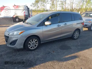 2013 Mazda 5 Sport with VIN JM1CW2BL4D0147779, listed as a IAAI auction lot 41860789 with 243,068 mi miles. Bid and sale history available at carsss.com. Image 2.