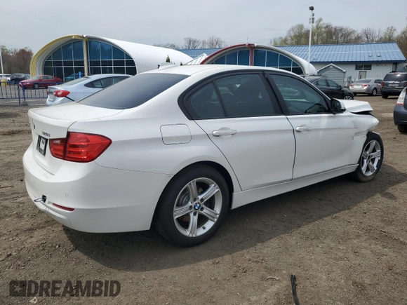 2015 BMW 3 Series 328i xDrive with VIN WBA3B5C53FF960590, listed as a Copart auction lot 54687145 with 54,520 mi miles and Salvage title. Bid and sale history available at DreamBid. Image 3.