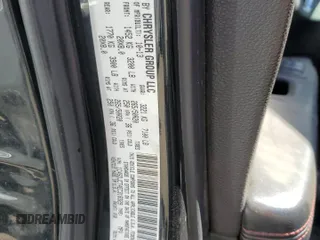 2014 Dodge Durango R/T z VIN 1C4SDJCT4EC318329, wystawiony jako Copart lot #55037725 z przebiegiem 224 058 mil mil oraz Szkoda całkowita • Salvage title. Historia ofert i sprzedaży dostępna na DreamBid. Obrazek 12.