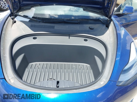 2021 Tesla Model 3 Standard Range Plus z VIN 5YJ3E1EAXMF098855, wystawiony jako IAAI lot #42226127 z przebiegiem 34 351 mil mil oraz . Historia ofert i sprzedaży dostępna na DreamBid. Obrazek 10.