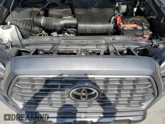 2020 Toyota Tacoma SR5 z VIN 3TYDZ5BN9LT000209, wystawiony jako Copart lot #56127875 z przebiegiem 92 350 mil mil oraz Szkoda całkowita • Salvage title. Historia ofert i sprzedaży dostępna na DreamBid. Obrazek 11.