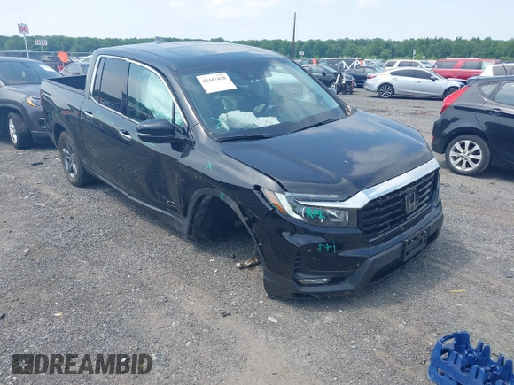 2023 Honda Ridgeline RTL-E with VIN 5FPYK3F71PB022739, listed as a IAAI auction lot 42447428 with 19,702 mi miles and . Bid and sale history available at DreamBid. Image 6.