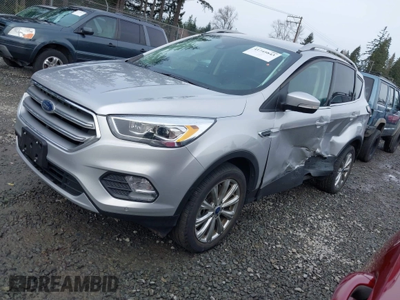 2017 Ford Escape Titanium with VIN 1FMCU9J97HUE98023, listed as a IAAI auction lot 41745843 with 24,857 mi miles. Bid and sale history available at carsss.com. Image 16.