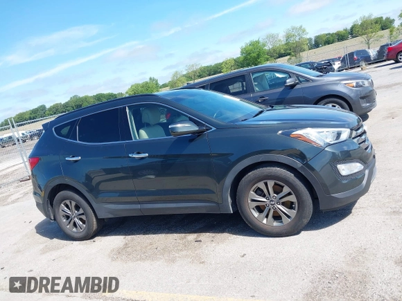 2014 Hyundai Santa Fe with VIN 5XYZUDLB0EG187984, listed as a IAAI auction lot 42607599 with 111,594 mi miles and . Bid and sale history available at DreamBid. Image 13.