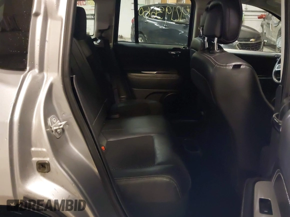 2016 Jeep Compass Latitude with VIN 1C4NJDEB4GD631759, listed as a IAAI auction lot 42193660 with 100,659 mi miles and . Bid and sale history available at DreamBid. Image 8.