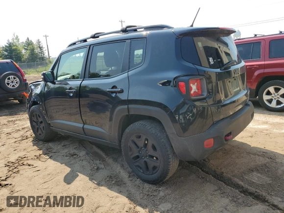 2017 Jeep Renegade Trailhawk z VIN ZACCJBCB2HPF40362, wystawiony jako Copart lot #58470555 z przebiegiem 157 832 mil mil oraz Czysty tytuł • Clean title. Historia ofert i sprzedaży dostępna na DreamBid. Obrazek 2.