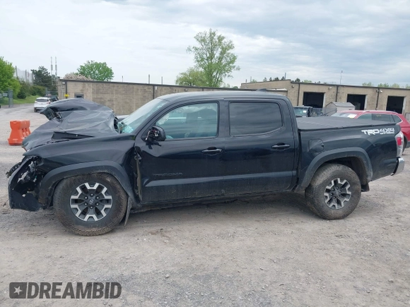 2023 Toyota Tacoma SR with VIN 3TMCZ5AN2PM598464, listed as a IAAI auction lot 42238032 with 35,597 mi miles and . Bid and sale history available at DreamBid. Image 14.