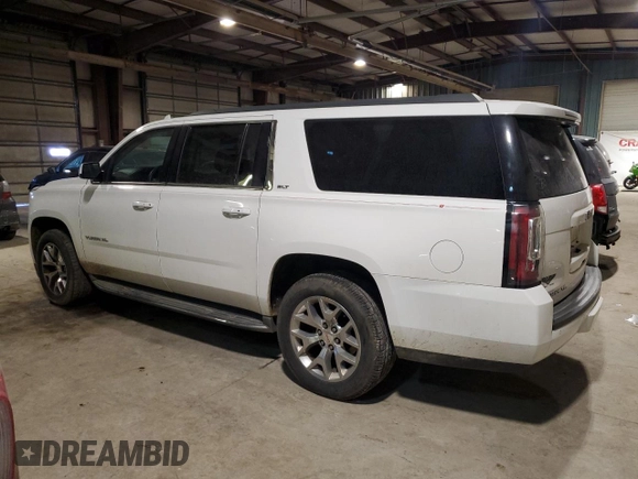 2015 GMC Yukon XL SLT with VIN 1GKS2HKC1FR541866, listed as a Copart auction lot 42756225 with 166,915 mi miles and Salvage Title. Bid and sale history available at carsss.com. Image 2.