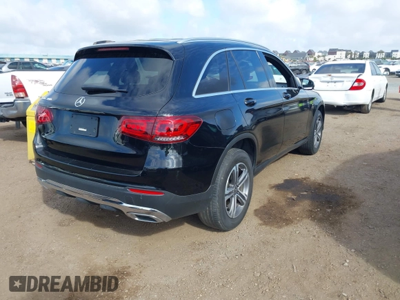 2020 Mercedes-Benz GLC 300 with VIN WDC0G8DB7LF718775, listed as a IAAI auction lot 41807370 with 59,120 mi miles and . Bid and sale history available at DreamBid. Image 4.