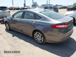 2014 Ford Fusion SE with VIN 3FA6P0HD7ER328428, listed as a IAAI auction lot 42242714 with 74,199 mi miles and . Bid and sale history available at DreamBid. Image 3.