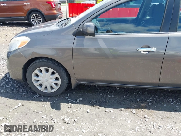 2013 Nissan Versa SV with VIN 3N1CN7AP9DL867511, listed as a IAAI auction lot 42680420 with 158,082 mi miles and . Bid and sale history available at DreamBid. Image 6.