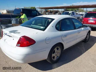 2002 Ford Taurus SEL with VIN 1FAFP56S02A140306, listed as a IAAI auction lot 40696933 with 1 mi miles. Bid and sale history available at carsss.com. Image 4.
