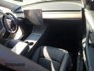 2024 Tesla Model Y Long Range with VIN 7SAYGDEE1RA245642, listed as a Copart auction lot 55490385 with Not provided miles and Salvage title. Bid and sale history available at DreamBid. Image 8.