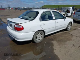 2001 Kia Sephia z VIN KNAFB121815044460, wystawiony jako IAAI lot #41846087 z przebiegiem 294 862 mil mil oraz . Historia ofert i sprzedaży dostępna na DreamBid. Obrazek 4.