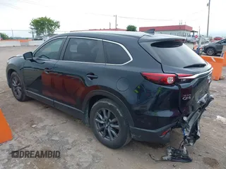 2021 Mazda CX-9 Sport with VIN JM3TCABY6M0522352, listed as a IAAI auction lot 42613136 with 106,167 mi miles and . Bid and sale history available at DreamBid. Image 3.