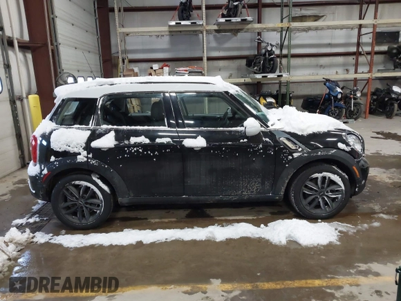 2014 MINI Countryman S with VIN WMWZC5C57EWP39161, listed as a IAAI auction lot 41342912 with 108,459 mi miles and . Bid and sale history available at DreamBid. Image 13.