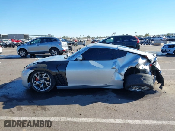 2014 Nissan 370Z Nismo with VIN JN1AZ4EHXEM634418, listed as a IAAI auction lot 41308580 with 84,074 mi miles and . Bid and sale history available at DreamBid. Image 14.
