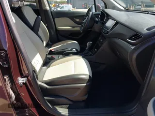 2018 Buick Encore Preferred with VIN KL4CJASB7JB572715, listed as a IAAI auction lot 41851839 with 97,797 mi miles and . Bid and sale history available at DreamBid. Image 5.