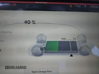 2013 Tesla Model S with VIN 5YJSA1CN0DFP20053, listed as a IAAI auction lot 41470660 with 61,568 mi miles and . Bid and sale history available at DreamBid. Image 18.
