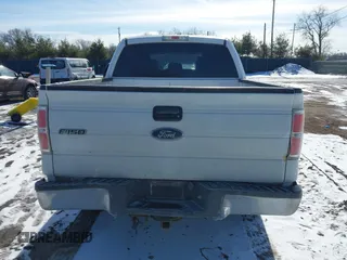 2014 Ford F-150 XL with VIN 1FTFW1EF5EFA45595, listed as a IAAI auction lot 41535410 with 124,208 mi miles. Bid and sale history available at carsss.com. Image 16.