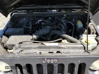 2008 Jeep Wrangler Unlimited X with VIN 1J4GA39168L509720, listed as a Copart auction lot 61014895 with 238,932 mi miles and Salvage title. Bid and sale history available at DreamBid. Image 12.