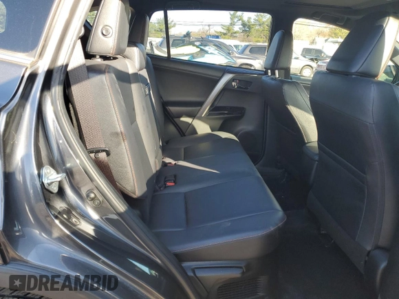 2018 Toyota RAV4 Hybrid SE with VIN JTMJJREV5JD210274, listed as a Copart auction lot 52450645 with 108,249 mi miles and Salvage title. Bid and sale history available at DreamBid. Image 11.