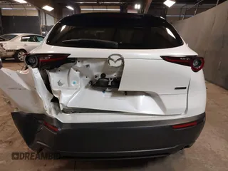 2021 Mazda CX-30 Preferred z VIN 3MVDMBCL2MM210902, wystawiony jako IAAI lot #42522203 z przebiegiem 42 995 mil mil oraz . Historia ofert i sprzedaży dostępna na DreamBid. Obrazek 17.