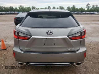 2019 Lexus RX 350 z VIN 2T2BZMCA8KC191259, wystawiony jako Copart lot #58379265 z przebiegiem 58 757 mil mil oraz Czysty tytuł • Clean title. Historia ofert i sprzedaży dostępna na DreamBid. Obrazek 6.