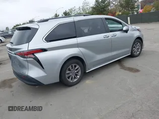 2021 Toyota Sienna XLE with VIN 5TDYRKEC6MS069690, listed as a IAAI auction lot 41841252 with 56,632 mi miles. Bid and sale history available at carsss.com. Image 4.