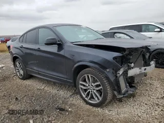 2018 BMW X4 M40i with VIN 5UXXW7C58J0W64432, listed as a Copart auction lot 46242344 with 74,344 mi miles. Bid and sale history available at carsss.com. Image 4.